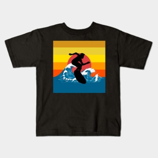Sufer surfing waves riding sunset sea Kids T-Shirt